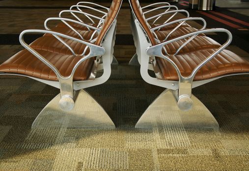 Abstract image of stylish designed waiting room seating at an airport.