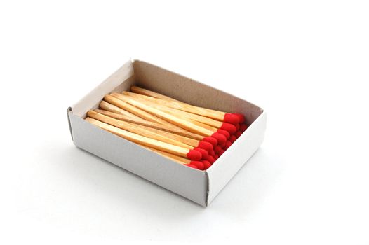 Some red matches isolated on a white background.