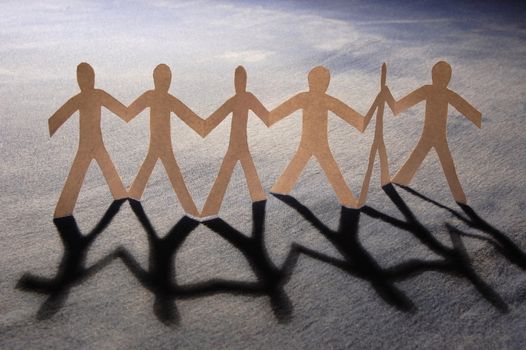 paper people doing teamwork in their business