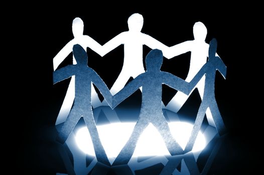 paper man showing teamwork help love and social networking