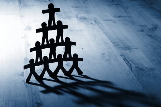 team of paper people showing concept of teamwork