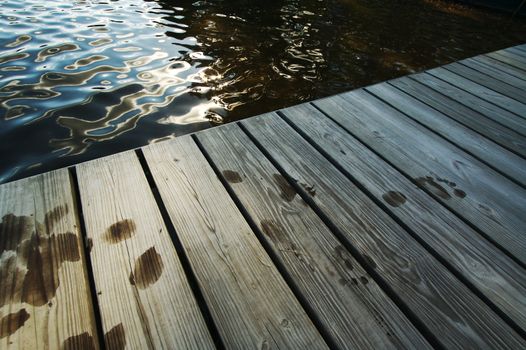 Lake Scene & Dock On A Summer Day