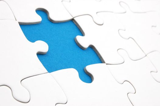 white jigsaw or puzzle background with copyspace