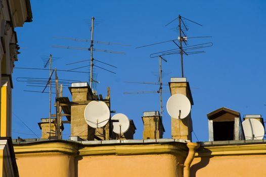 TV antennas on the building roof in St.Petersburg, Russia