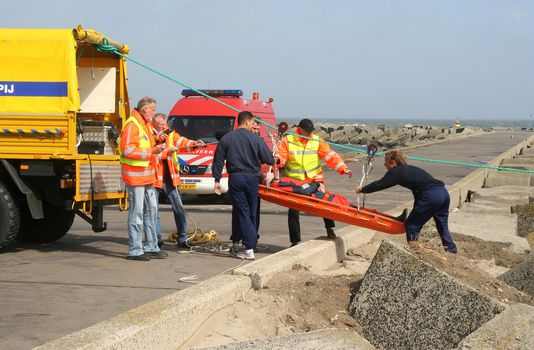 Person being rescued by a rescue team