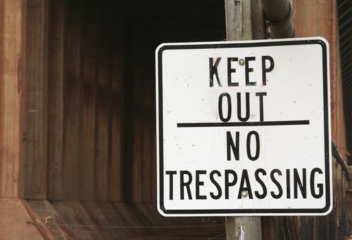 Keep Out, No Trespassing Sign on Abandoned Dock