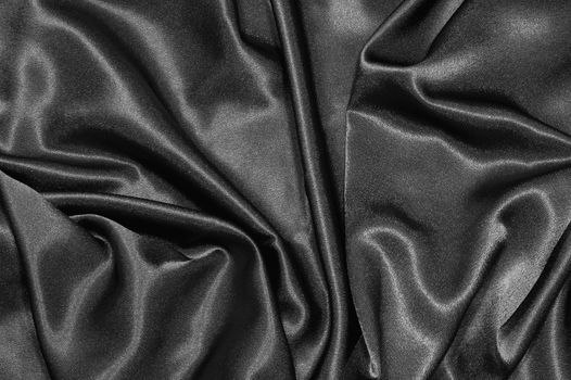 black satin or silk background with textile texture