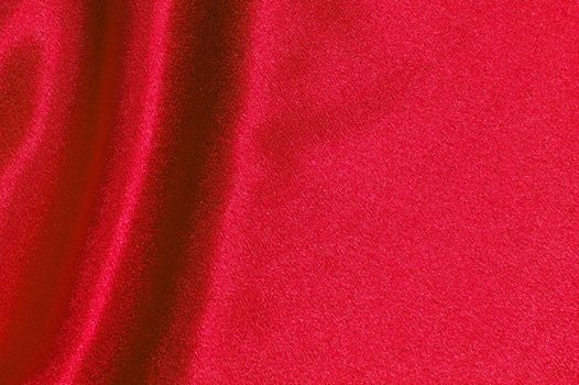 red satin or silk background with textile texture