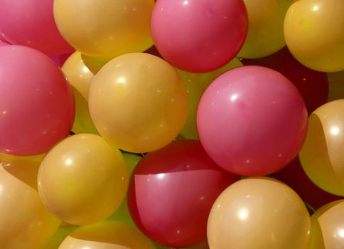 red and yellow party balloons close-up