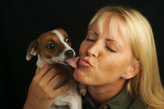 Attractive Woman Holds Her Jack Russell Terrier Dog