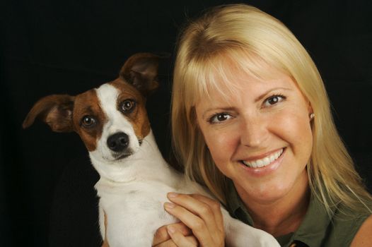 Attractive Woman Holds Her Jack Russell Terrier Dog