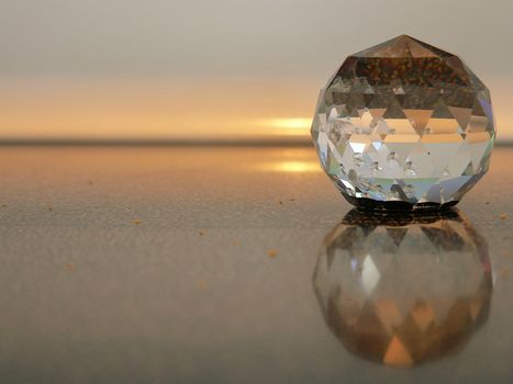 A crystal paperweight sitting on a smooth-top stove almost looks like an alien sea-scape