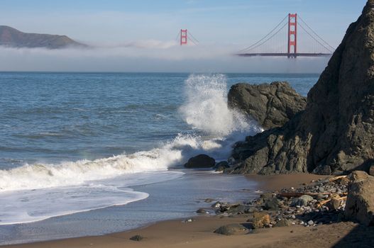 The Golden Gate Bridge in the early morning fog. San Francisco, California, United States.