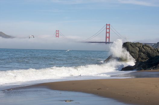 The Golden Gate Bridge in the early morning fog. San Francisco, California, United States.