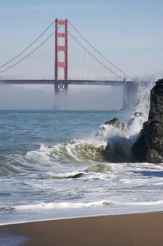 The Golden Gate Bridge in the early morning fog. San Francisco, California, United States.