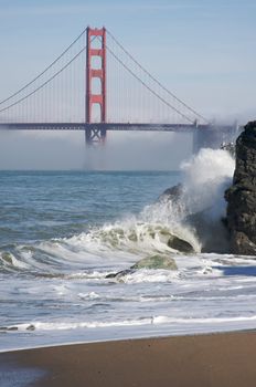 The Golden Gate Bridge in the early morning fog. San Francisco, California, United States.