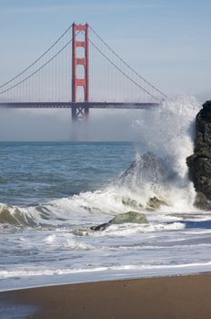 The Golden Gate Bridge in the early morning fog. San Francisco, California, United States.