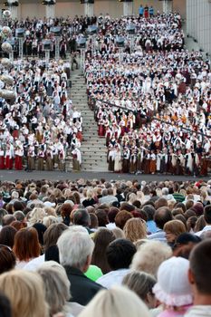 RIGA - JULY 5: Audience of Song and dance festival grand opening concert in Riga, Latvia, 5 July, 2008