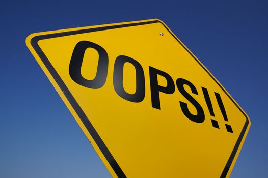 Oops! Road Sign with Dramatic Blue Sky.