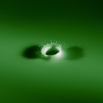 Abstract photos of milk droplets falling and captured on impact