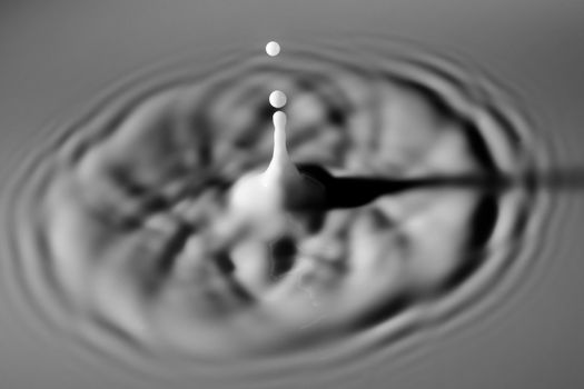 Abstract photos of milk droplets falling and captured on impact