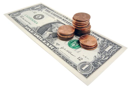 Pennies on the Dollar - one dollar bill with small stacks of pennies on top on a white background.