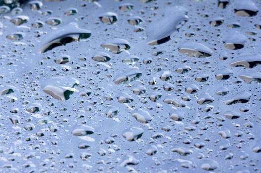 Macro Shot of Water Drops on Glass