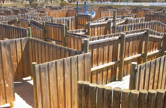 a wooden playground maze from above
