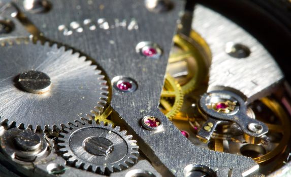 close-up part of clock mechanism, shalow dof