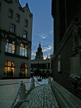 a little street conducts in the center of old city (Krakov)