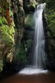 waterfall in  czech mountain, vertically framed picture