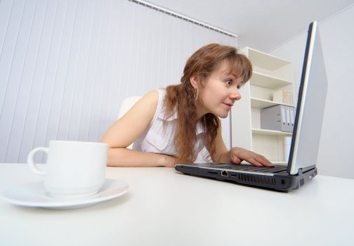 Young woman keen on watching pornographic sites on the Internet