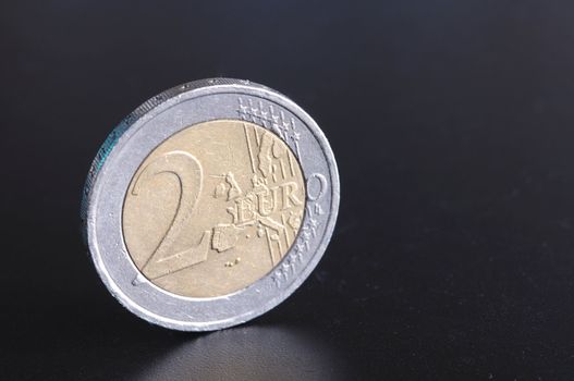 ouro money coin an black background with copyspace for textmessage