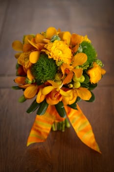 Image of a beautiful floral bouquet on wood table