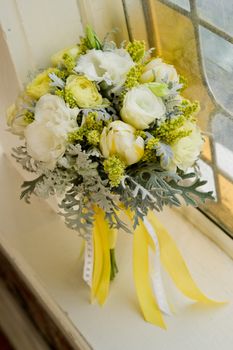 Image of a beautiful floral bouquet in window sill