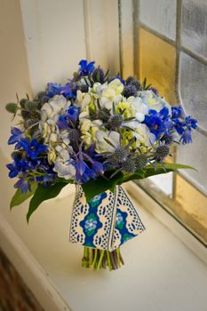 Image of a beautiful floral bouquet in window sill