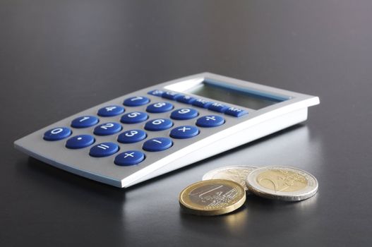 money and calculator showing banking accounting or savings concept