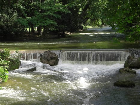 a waterfall on a sunny day