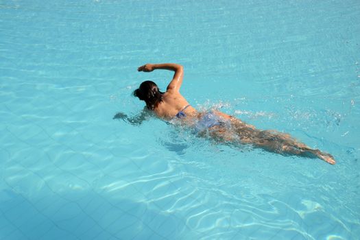 girl in the swimming pool