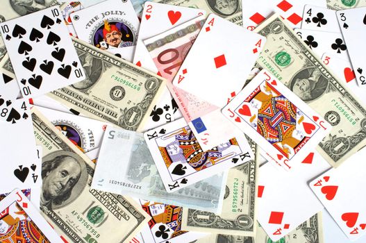 Background from playing cards and monetary denominations.