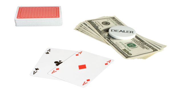 Two ases, pack and dollars, it is isolated on a white background.