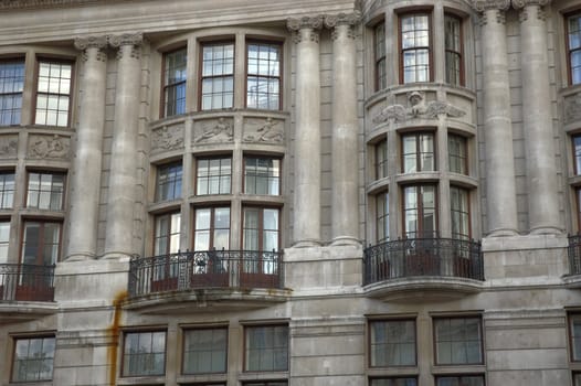 A detail of some windows on a old building