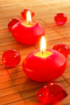 romantic red candles showing spa or love concept