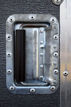 Metallic rivets of a road case (for transporting music and lightning equipment).