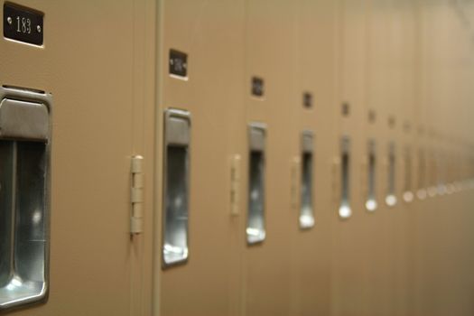 Row of lockers, with focus on the first one.