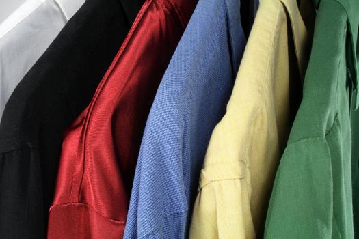 Closeup of colorful clothes (shirts of different colors).