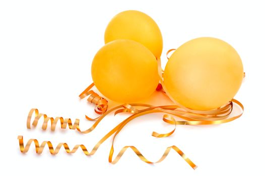 Orange balloons with gold twisted ribbons on overwhite background.