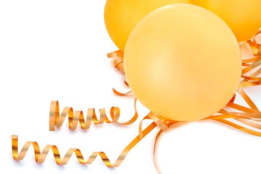 Orange balloons with gold twisted ribbons on overwhite background.