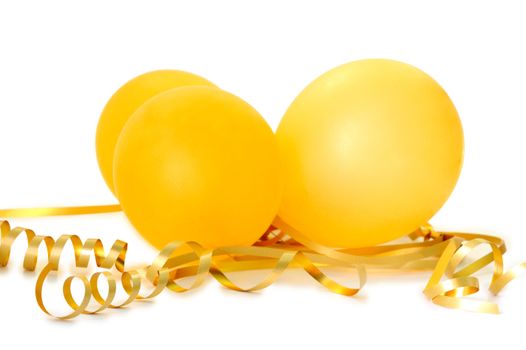 Orange balloons with gold twisted ribbons on overwhite background.