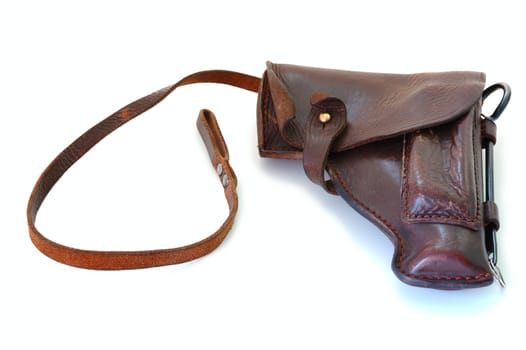 Old brown leather military holster on overwhite background.